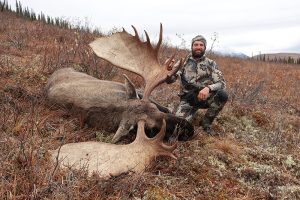 Billy Molls with moose